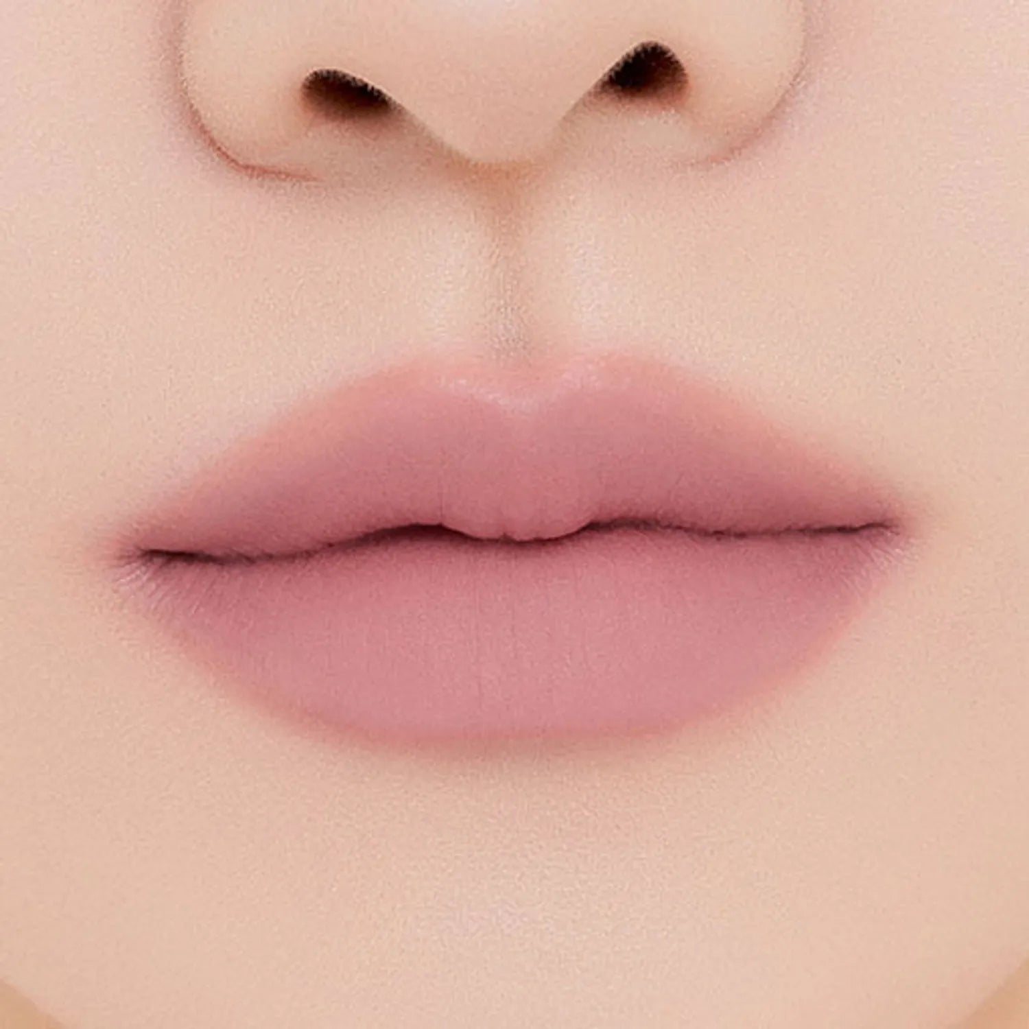 MUZIGAE MANSION Tie Up Cover Tint in sculpted knot tube with soft matte mousse formula. Shade Pink Step