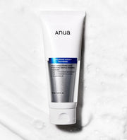 Anua 8 Hyaluronic Acid Hydrating Gentle Foaming Cleanser bottle with foam on hand, showcasing moisturizing Korean skincare cleanser.