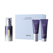 OHUI Age Recovery skincare set with serum, cream, and box on a white background