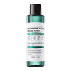 Skincare toner bottle with green cap and detailed label on white background