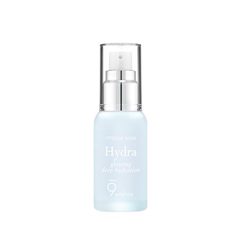 A bottle of 9wishes Hydra Ampule Base with a clear liquid visible inside, designed for skin moisturization and makeup adherence.