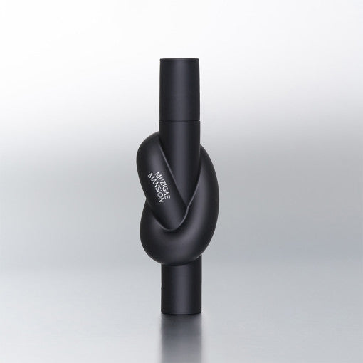 art-inspired MUZIGAE MANSION lip tint in sculptural tube with matte finish