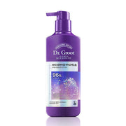 A bottle of Dr.Groot Bio Exosome Scalp Hair Loss Total Care Conditioner with a purple label and pump dispenser.