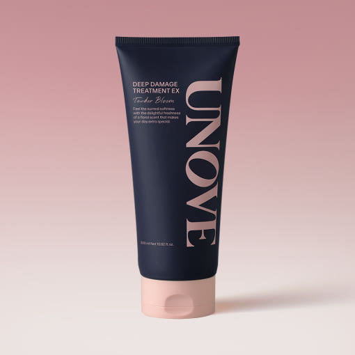 UNOVE Deep Damage Treatment EX 320ml tube in soft beige packaging, standing upright with sleek, minimal design on a neutral background