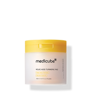 Close-up of medicube Kojic Acid Turmeric toner pads in round container, soft textured pads, Korean brightening skincare